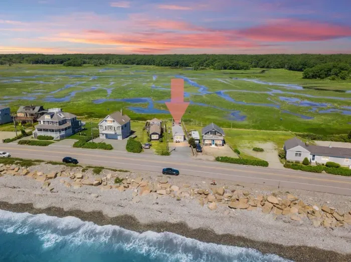 Aerial view, across the street from the ocean, large private lawn area and roof deck to relax, sunbath and grill