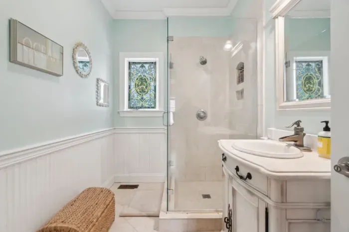 Bathroom #2 with with tiled standing shower