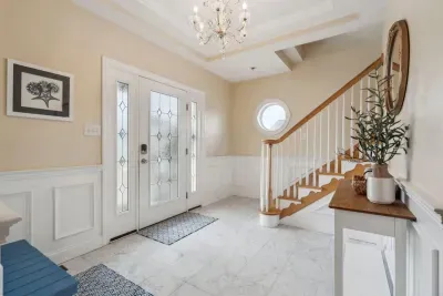 Foyer - upstairs is the kitchen and living area and downstairs are 3 bedrooms