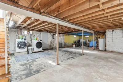 The basement is accessed right off of the kitchen. There is a full size washer and dryer down here you can use. Please do not touch or use the owner's items on the other side of the basement