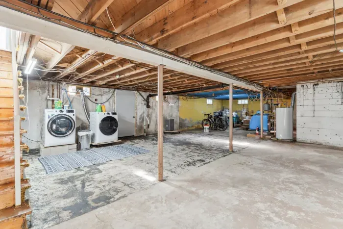 The basement is accessed right off of the kitchen. There is a full size washer and dryer down here you can use. Please do not touch or use the owner's items on the other side of the basement