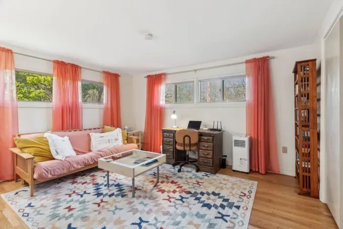 Bedroom #3 with a full size futon and desk! Clean linens and blankets provided for the futon