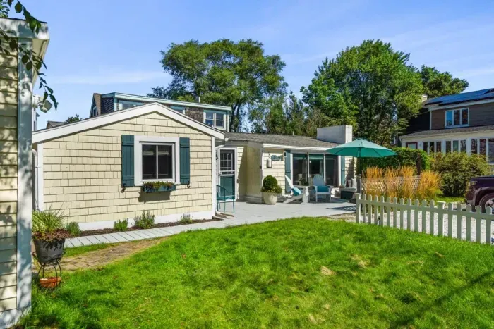 Welcome to the Riverside Cottage Retreat! Ample parking, a beautiful yard, and large deck.