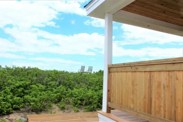 wrap-around porch at the back of the cottage