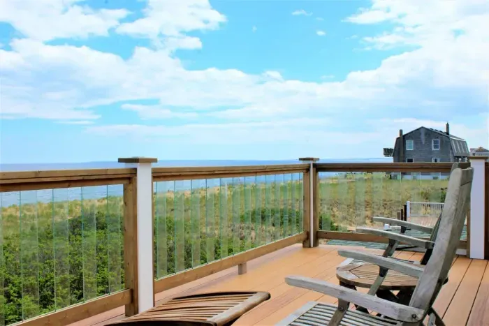 Bedroom #2 on 2nd floor with full bed and balcony access overlooking the Atlantic.