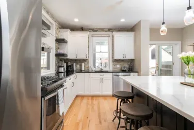 A dream chef's kitchen, with top appliances, perfect for dining and entertaining