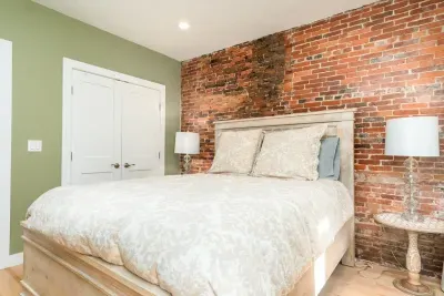Main level master bedroom with queen-sized bed