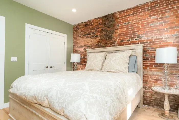 Main level master bedroom with queen-sized bed