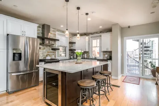 A chef's dream kitchen, with slide in range and huge island, this is the perfect spot for dining and entertaining