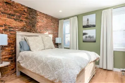 Main level primary bedroom with queen-sized bed