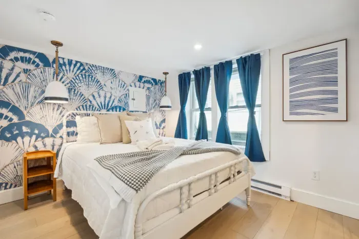 The second bedroom with Smart TV, queen bed, and provided clean linens!