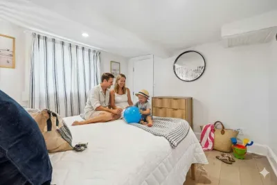 The second bedroom with Smart TV, queen bed, and provided clean linens!