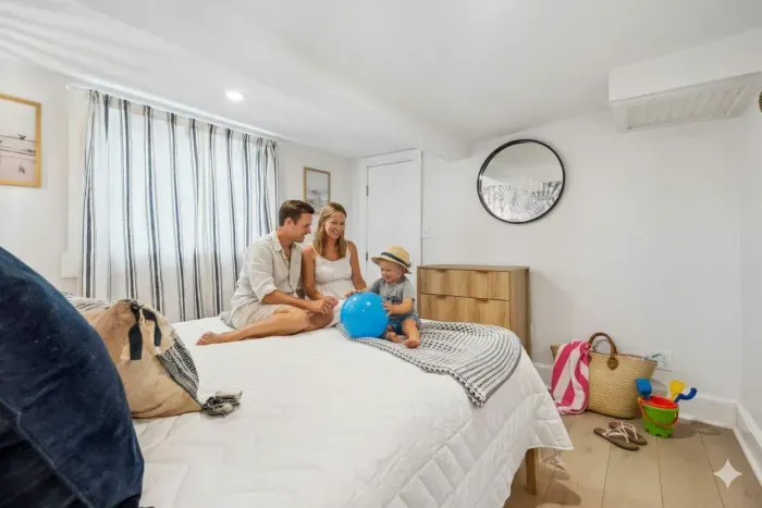 The second bedroom with Smart TV, queen bed, and provided clean linens!