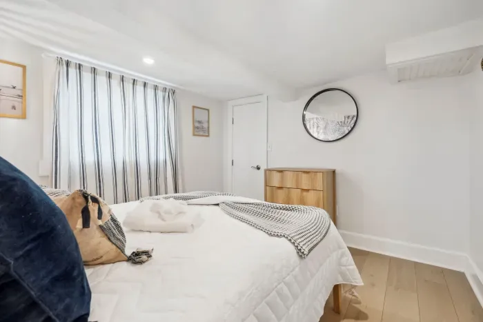 The second bedroom with Smart TV, queen bed, and provided clean linens!
