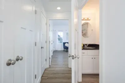 1/2 bath in the hallway with complimentary towels and soaps.