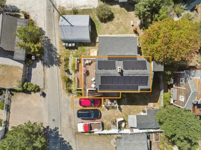 Top view of the unit. Parking for 1 vehicle. Please note that the pathway is shared with the lower unit but the home has it's own private entrance at the top of the stairs. 