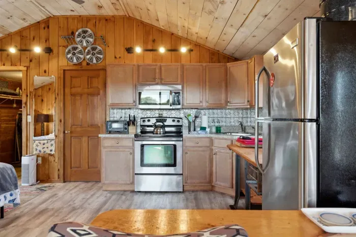 Fully equipped kitchen with Fully equipped kitchen with updated appliances! Coffee provided! views from the windows