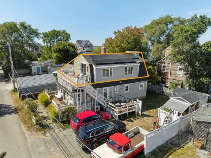 The unit is located up a flight of stairs on the second level of this 2 unit property