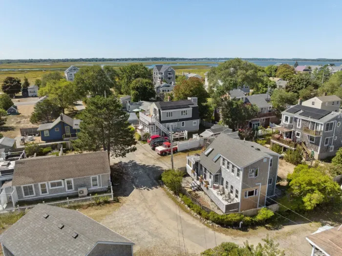 Aerial view of the property and neighborhood
