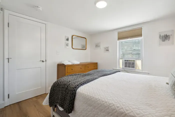 The primary bedroom with a Queen bed and clean linens provided!