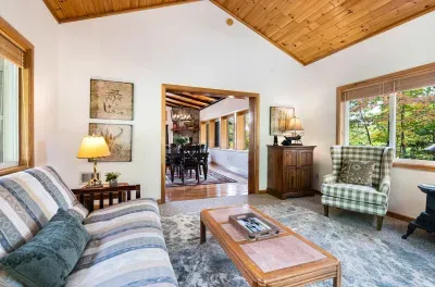 Another look at the sunroom. PLEASE NOTE - this is the sleeping accommodation for the 8th guest. This is a great space to get away from the commotion!