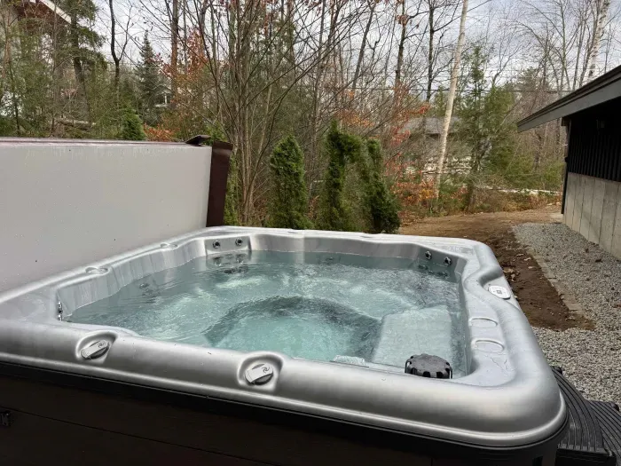 This tub is professionally maintained and close to the side entrance of the house!
