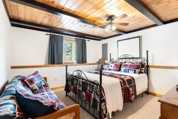 This is bedroom #2 with the queen bed, Roku smart TV, and couch. Clean linens provided