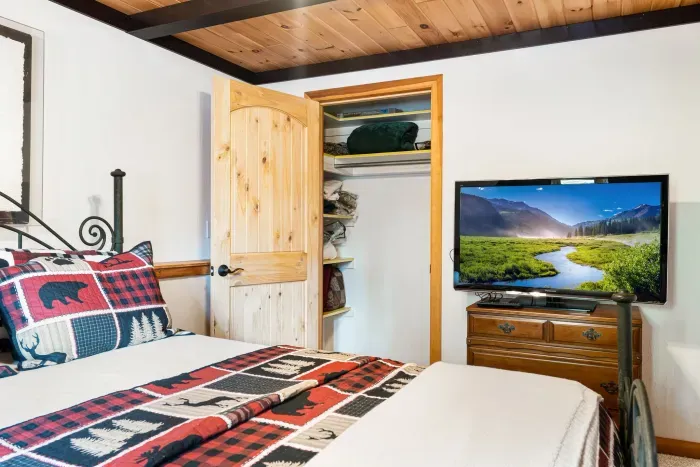 This is bedroom #2 with the queen bed, Roku smart TV, and couch. Clean linens provided