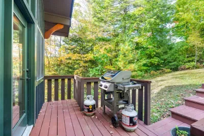 The grill is located off the sunroom, perfect for those BBQs!
