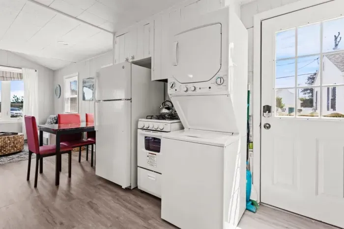 Fully stocked & equipped kitchen with in-house stackable laundry