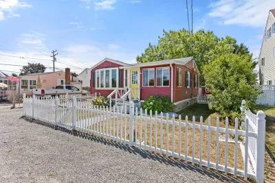 Front of home with 4 off-street parking spots