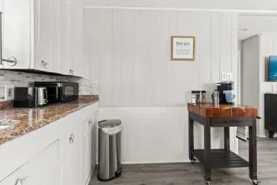 Fully stocked & equipped kitchen with in-house stackable laundry