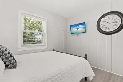 Bedroom #1 with queen bed  and Roku Smart TV