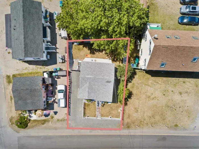 Aerial views - Walkable to the beach, off-street parking for up to 4 cars, private fenced in yard.