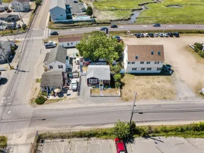 Aerial views - Walkable to the beach, off-street parking for up to 4 cars, private fenced in yard.