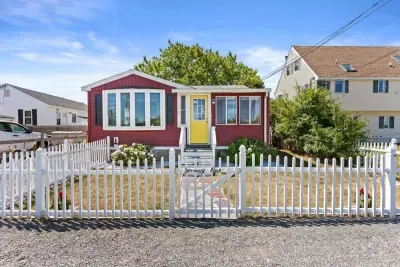 Front of home with 4 off-street parking spots