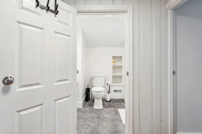 The BRAND NEW second floor bathroom! Equipped with a tiled standing shower. Clean towels provided for all guests