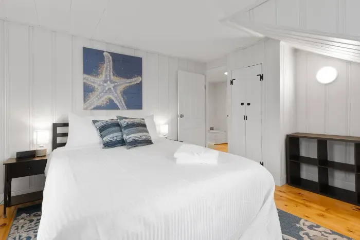 Bedroom #2 with queen bed and smart TV