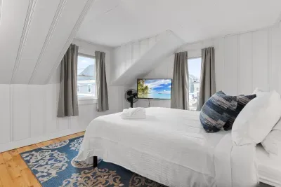 Bedroom #2 with queen bed and smart TV