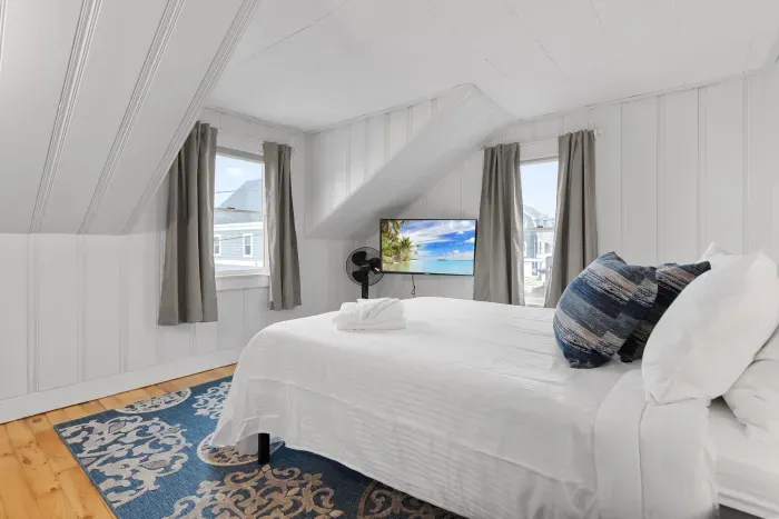 Bedroom #2 with queen bed and smart TV