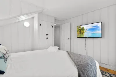 Bedroom #3 with queen bed and smart TV