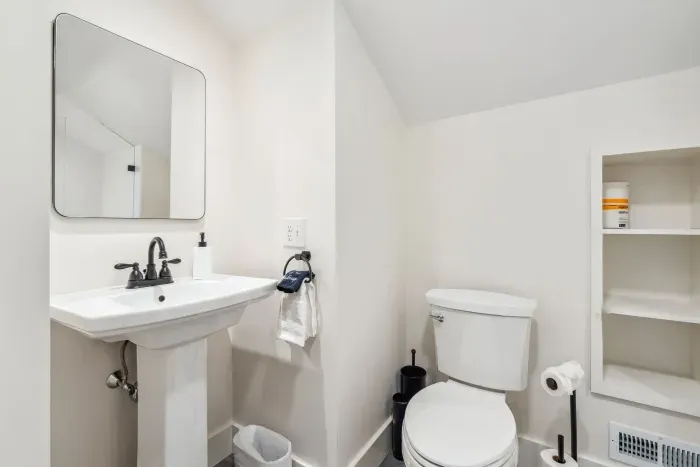 The BRAND NEW second floor bathroom! Equipped with a tiled standing shower. Clean towels provided for all guests