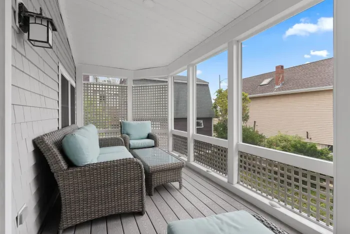 Cozy screened in porch off the living room