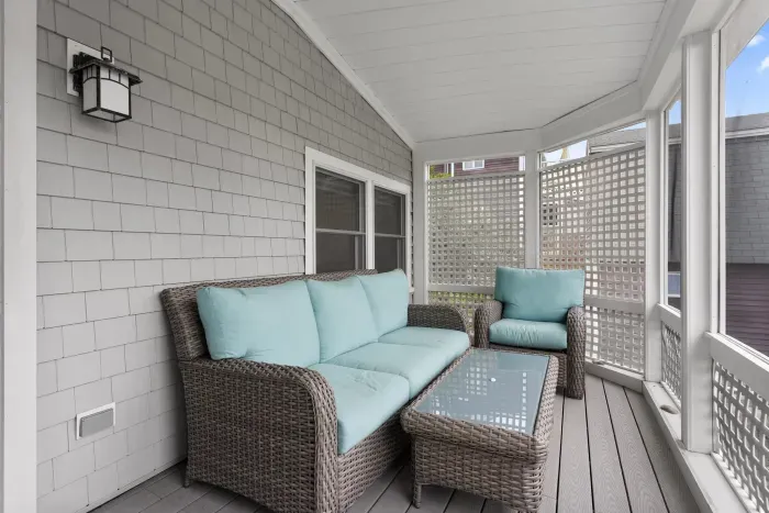 Cozy screened in porch off the living room