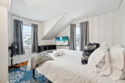 Bedroom #2 with queen bed and smart TV