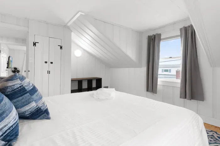 Bedroom #2 with queen bed and smart TV