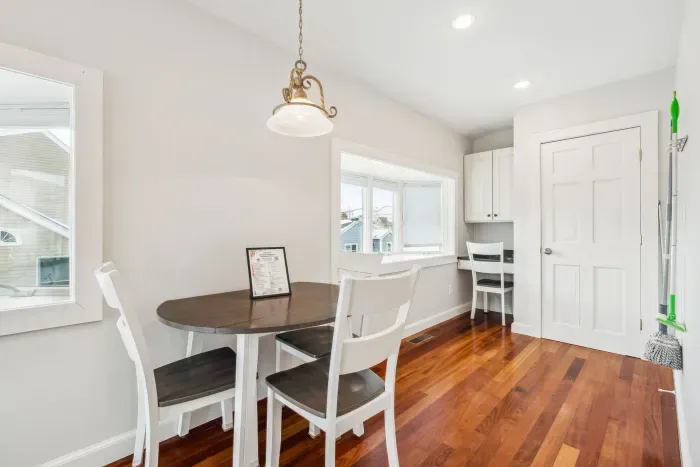 Breakfast nook with private desk area and storage closet!