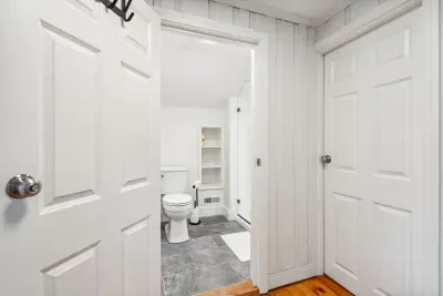 The BRAND NEW second floor bathroom! Equipped with a tiled standing shower. Clean towels provided for all guests