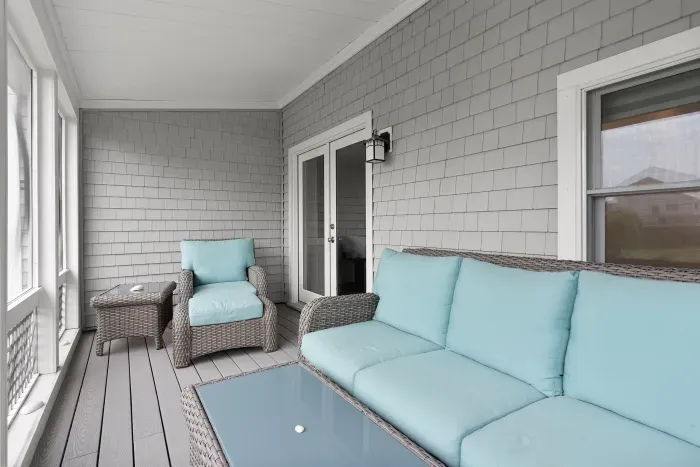 Cozy screened in porch off the living room