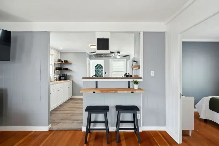 Bar stools by the kitchen counter for 2